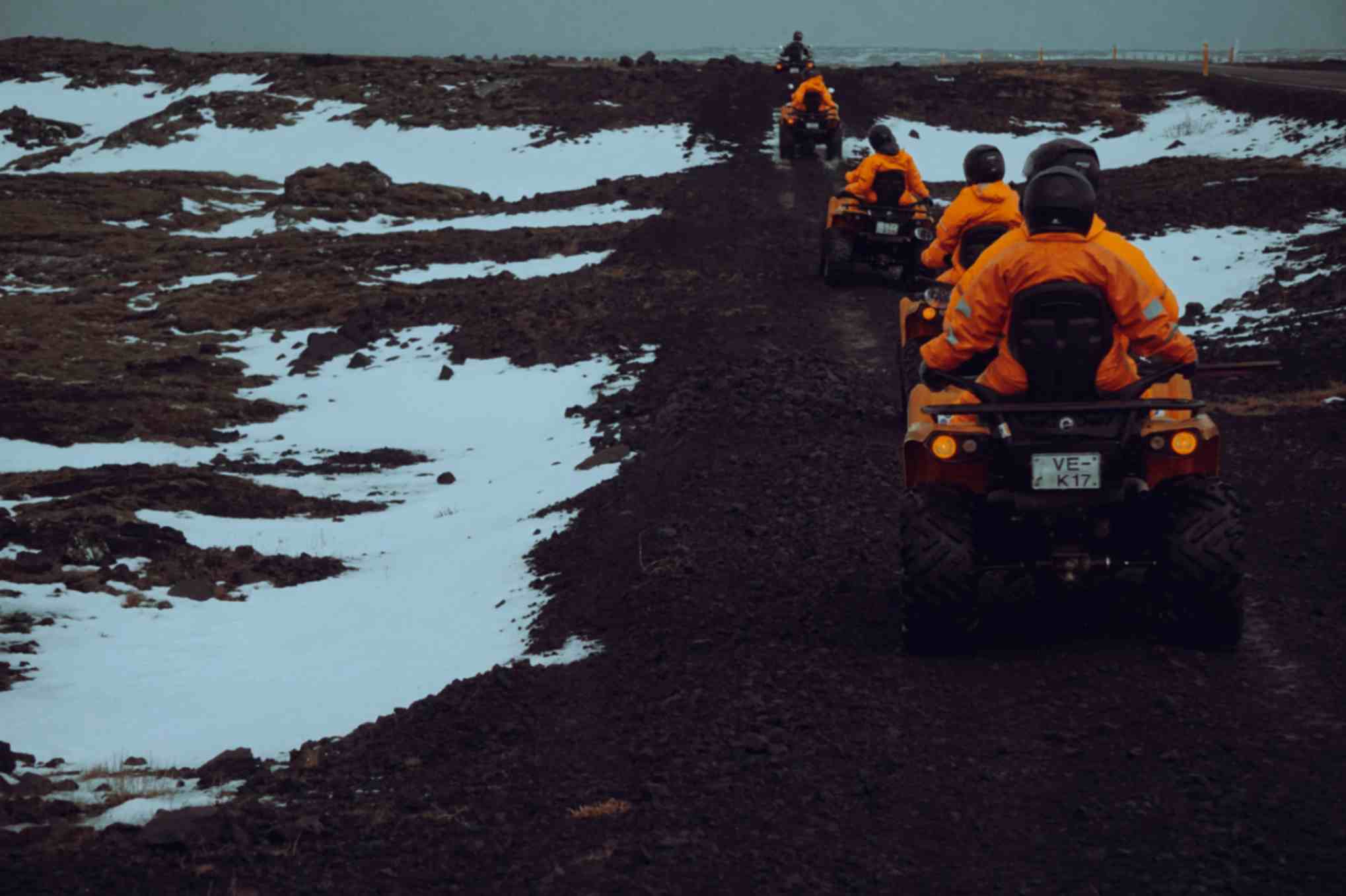 ATV riding on black sand beach near Vík Iceland