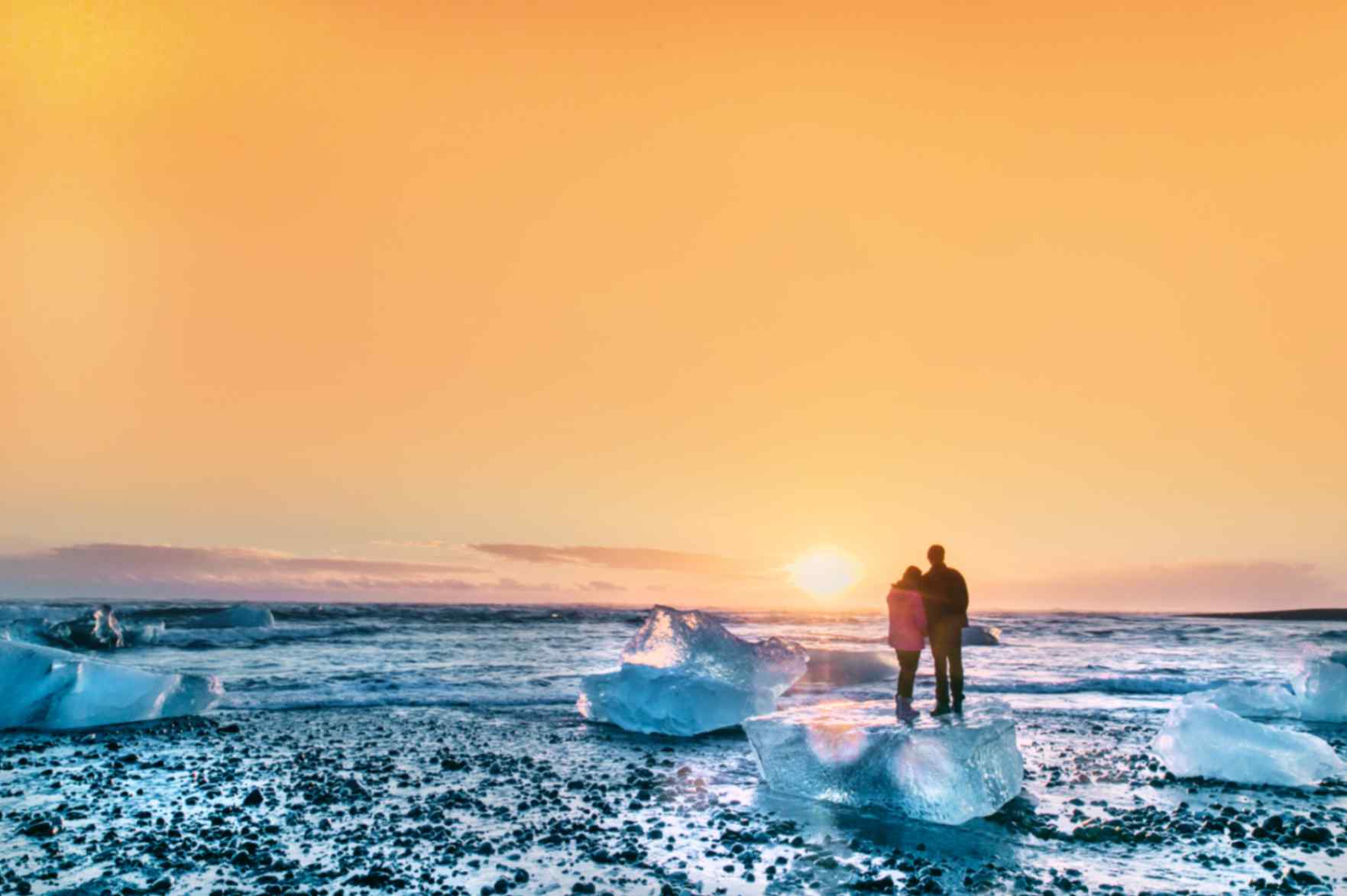 Ice chunks on black sand at Diamond Beach in Iceland