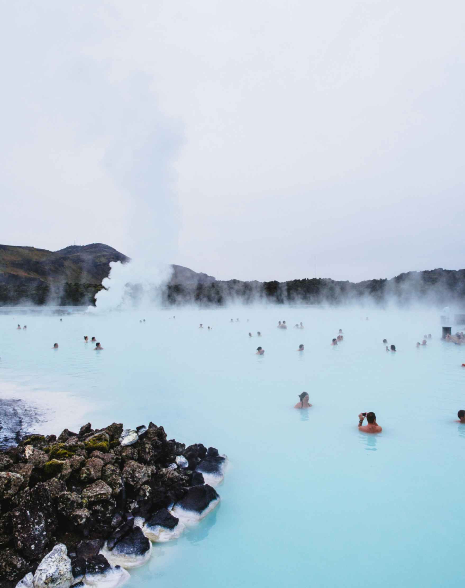 Blue Lagoon geothermal spa with milky blue water and volcanic rocks in Iceland Blue Lagoon geothermal spa with milky blue water and volcanic rocks in Iceland