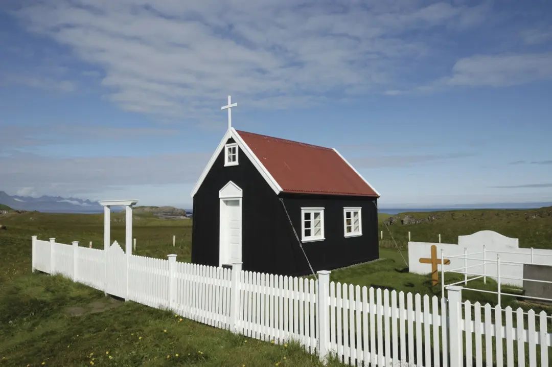 Small black church on Papey Island in North Iceland Small black church on Papey Island in North Iceland